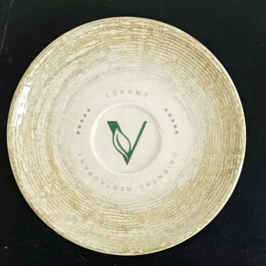 Gold saucer produced for a venue